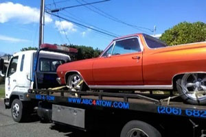 Available Pioneer Square flatbed tow truck in WA near 98104