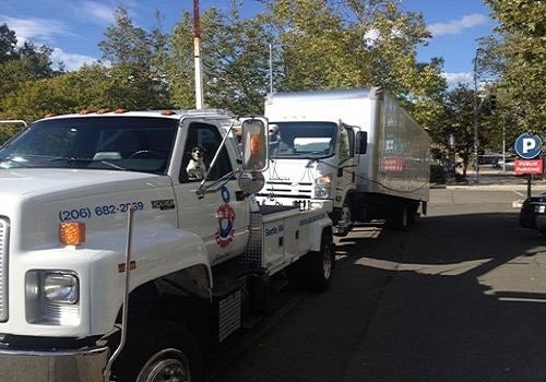 Covington semi truck winching services in WA near 98042