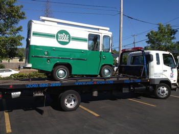 24 Hour Pioneer Square flatbed towing service in WA near 98104