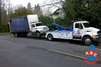 Fast Redmond heavy equipment towing in WA near 98008